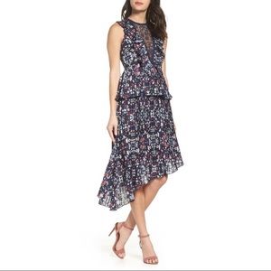 FOXIEDOX Asymmetrical Pleated Peplum Dress